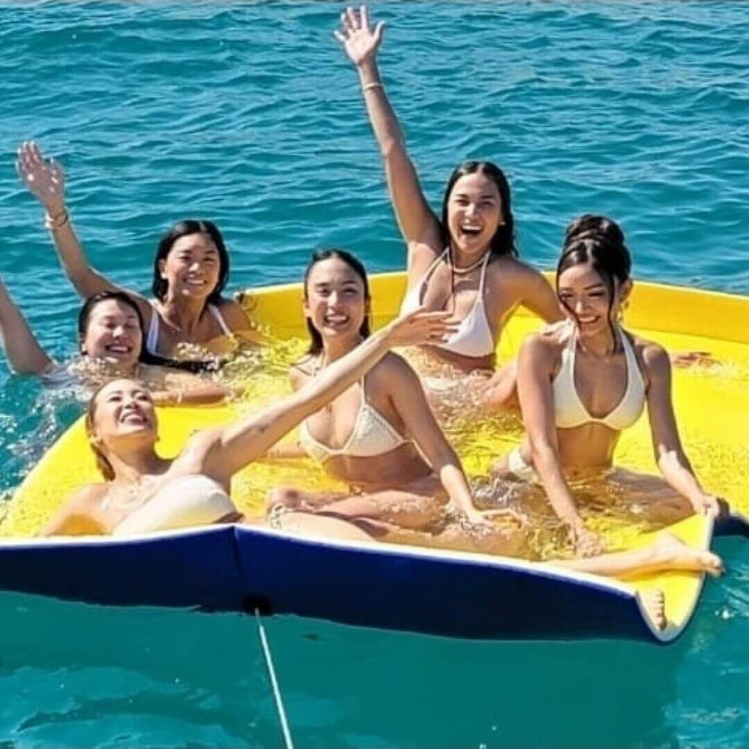woman on raft in ocean
